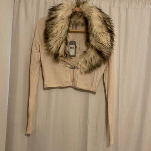 GUESS cropped sweater with faux fur collar.